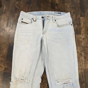 Empyre Skeletor Skinny light blue jeans, straight leg. Ripped knee. 32 x 30